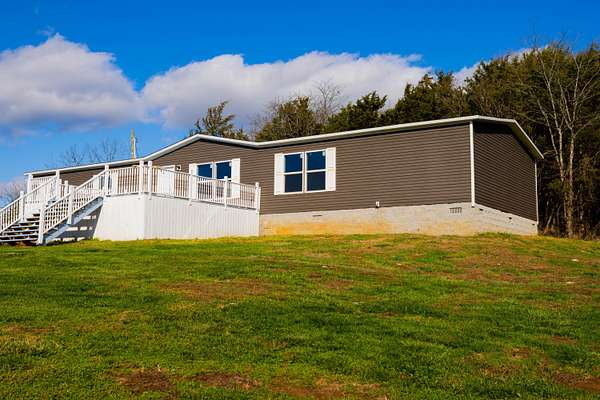 15.5 Acres of Land with Home for Sale in Somerset, Kentucky