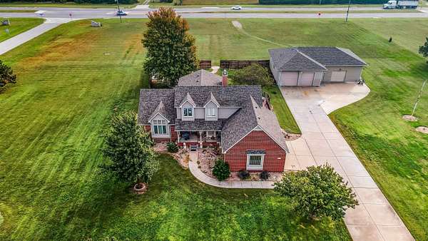 3 Acres of Residential Land with Home for Auction in Rose Hill, Kansas