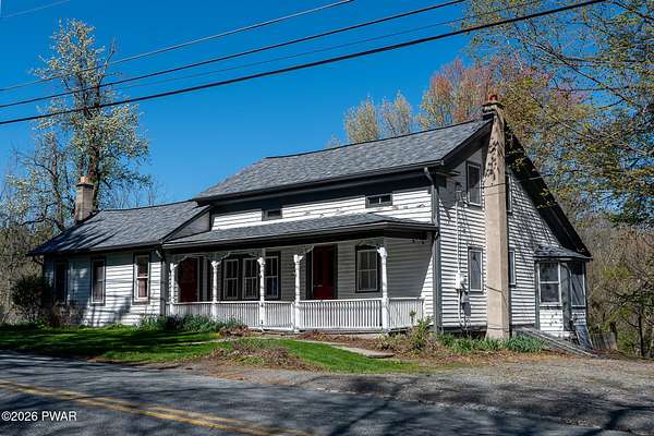 5.6 Acres of Land with Home for Sale in Beach Lake, Pennsylvania