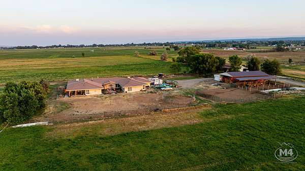 30 Acres of Land with Home for Sale in Hotchkiss, Colorado