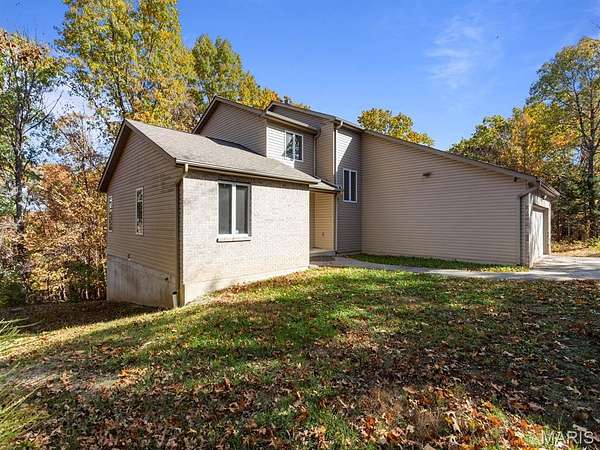 4 Acres of Residential Land with Home for Sale in House Springs, Missouri