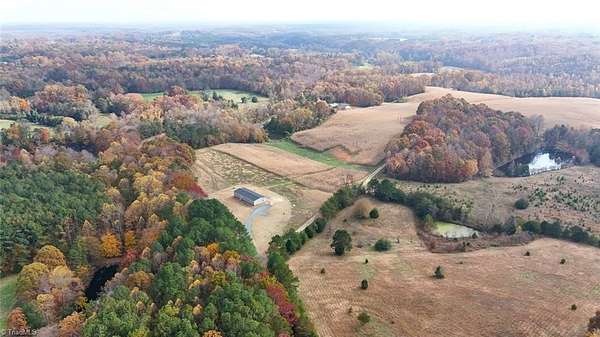 27.8 Acres of Land with Home for Sale in East Bend, North Carolina