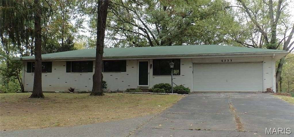 3 Acres of Residential Land with Home for Sale in Oakville, Missouri