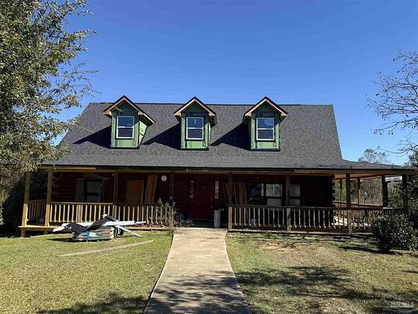 9 Acres of Residential Land with Home for Sale in Molino, Florida