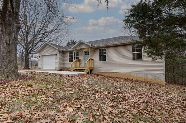 1.5 Acres of Residential Land with Home for Sale in Highlandville, Missouri