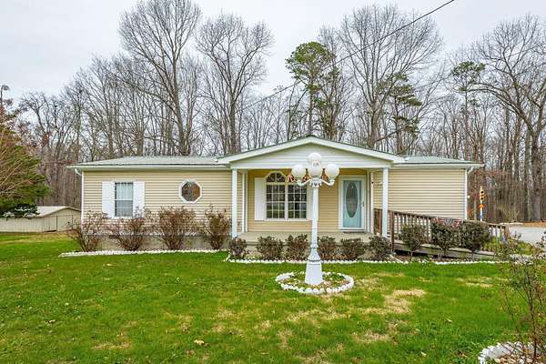 2 Acres of Residential Land with Home for Sale in Bryant, Alabama