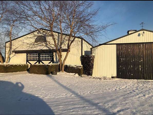 16 Acres of Land with Home for Sale in Versailles, Kentucky