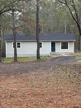 5 Acres of Residential Land with Home for Sale in Gilmer, Texas