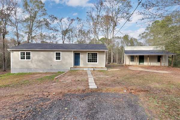 5 Acres of Land with Home for Sale in Gilmer, Texas