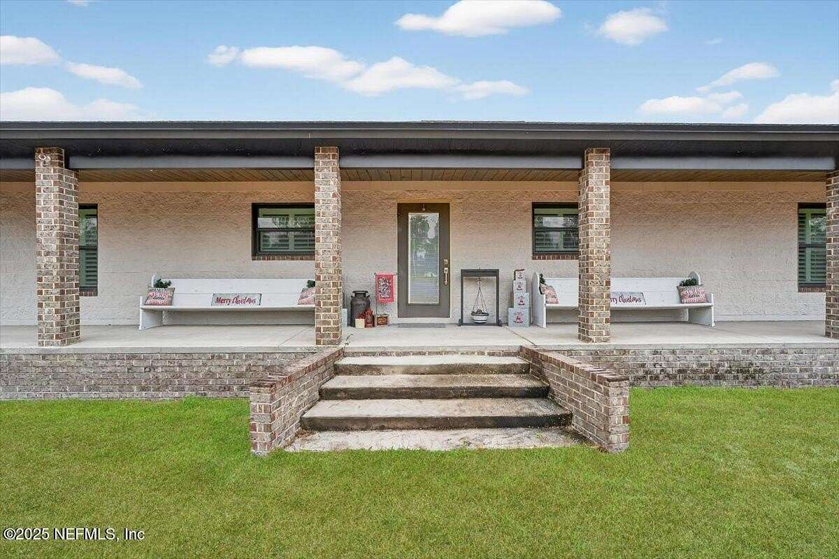 11.8 Acres of Land with Home for Sale in Glen St. Mary, Florida