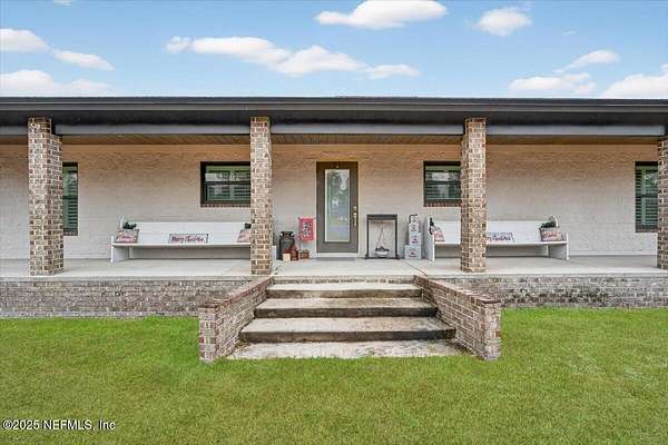 11.8 Acres of Land with Home for Sale in Glen St. Mary, Florida