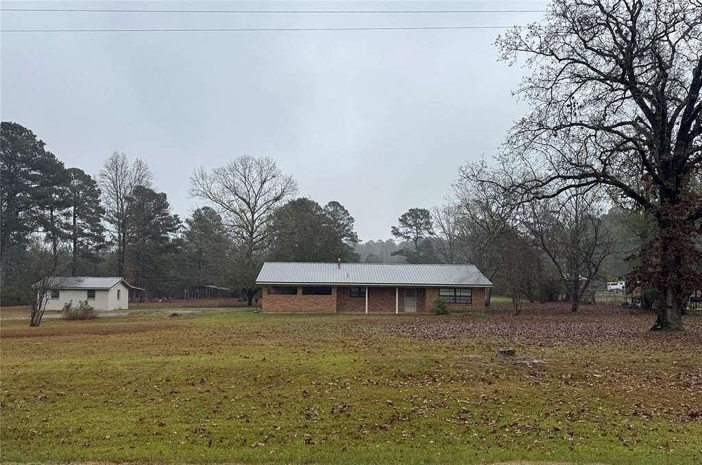 10.8 Acres of Land with Home for Sale in Shongaloo, Louisiana