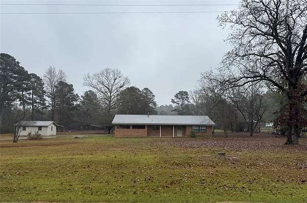 10.8 Acres of Land with Home for Sale in Shongaloo, Louisiana