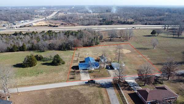 1.78 Acres of Residential Land with Home for Sale in Poplar Bluff, Missouri