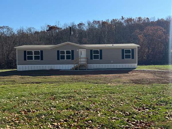 5.5 Acres of Residential Land with Home for Sale in Huntsville, Arkansas