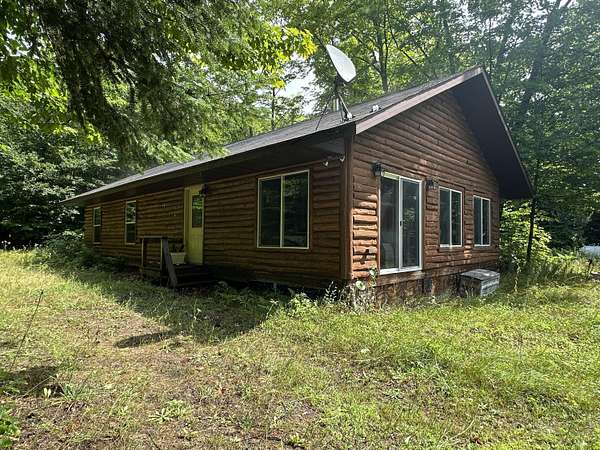 10 Acres of Residential Land with Home for Sale in McMillan, Michigan