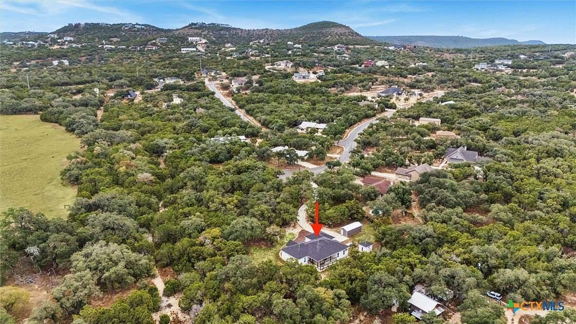 1.9 Acres of Residential Land with Home for Sale in Canyon Lake, Texas