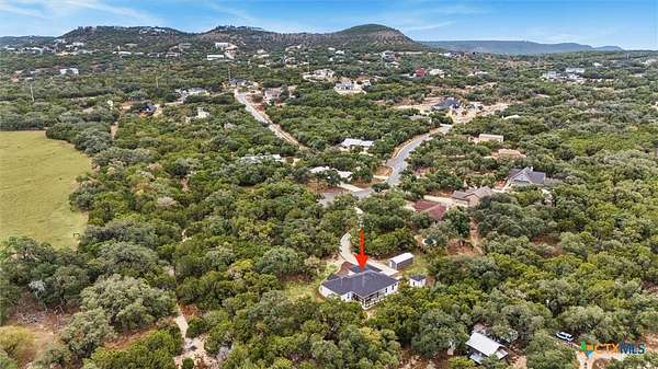 1.9 Acres of Residential Land with Home for Sale in Canyon Lake, Texas