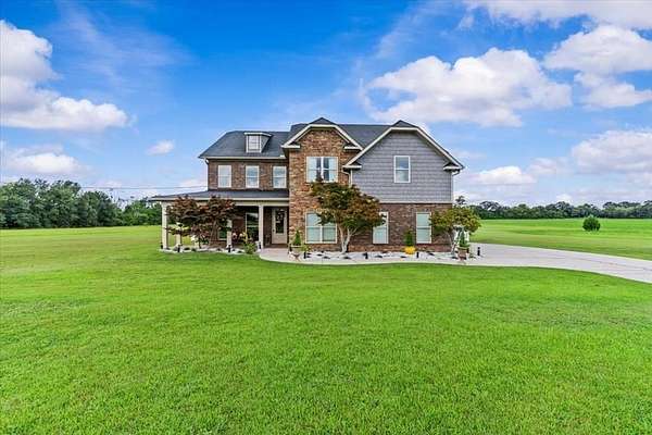 7.3 Acres of Residential Land with Home for Sale in Wicksburg, Alabama