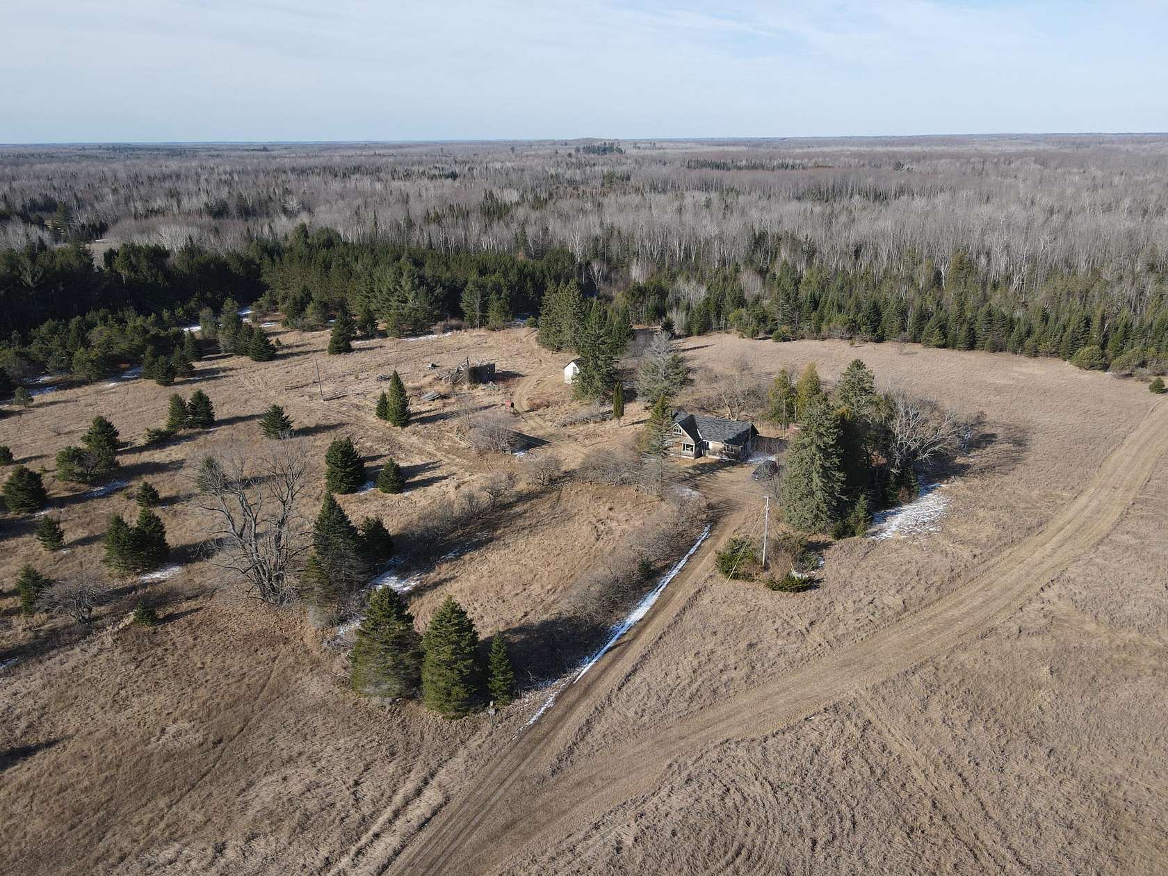 102 Acres of Land with Home for Sale in Posen, Michigan