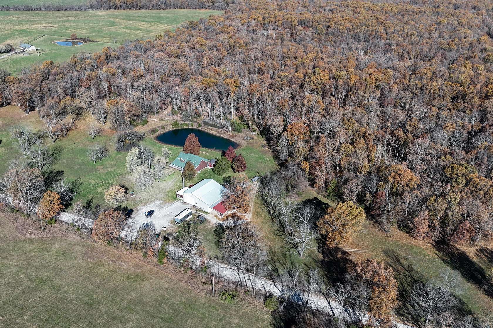 76.2 Acres of Land with Home for Sale in Norwood, Missouri
