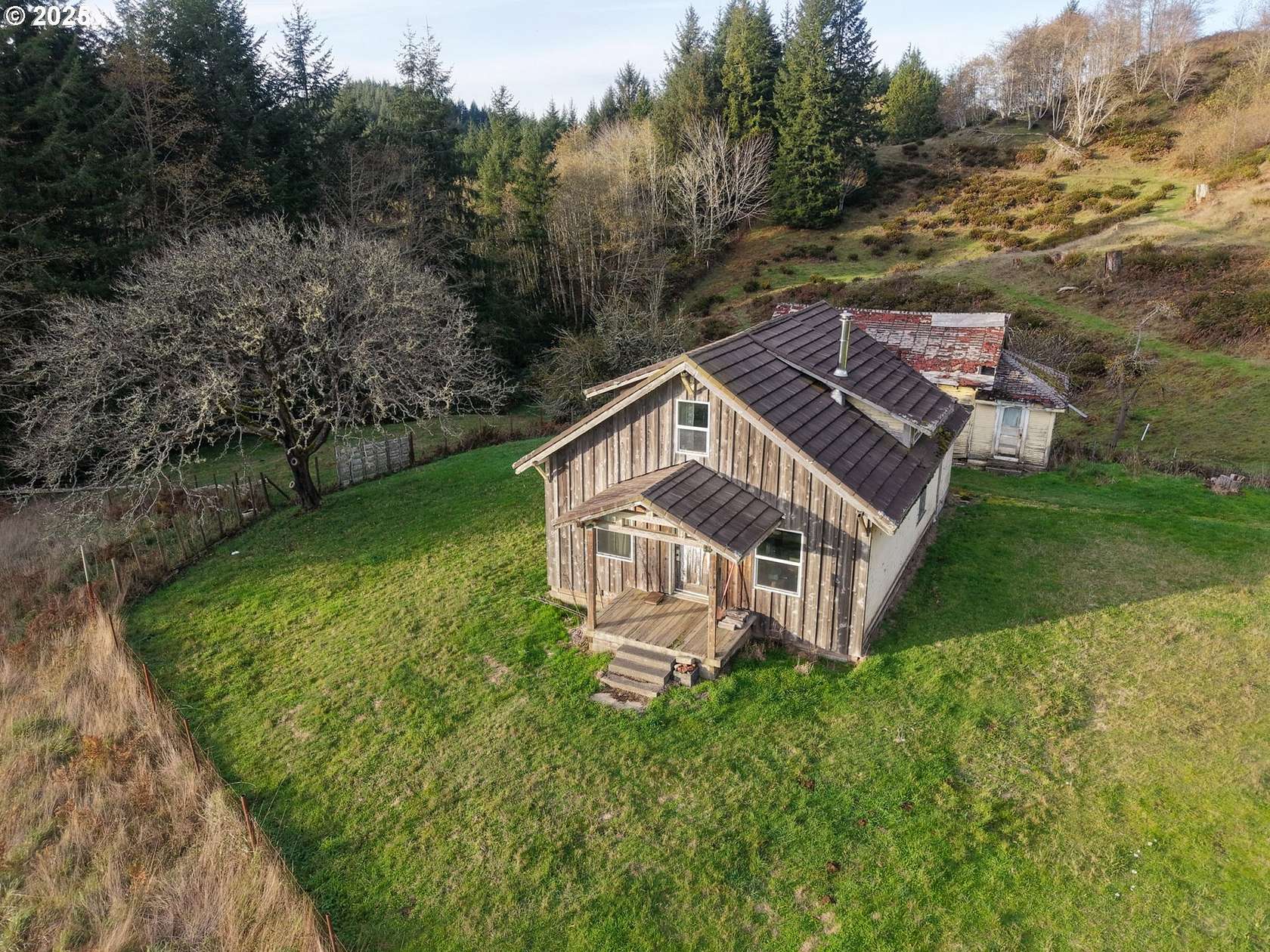 80 Acres of Agricultural Land with Home for Sale in North Bend, Oregon