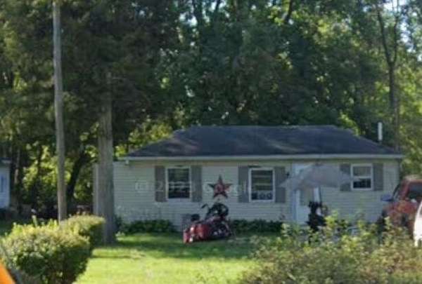 0.89 Acres of Residential Land with Home for Sale in Jackson, Michigan