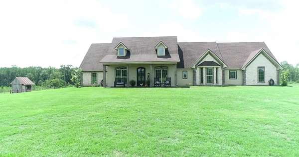 95.8 Acres of Land with Home for Sale in Bronson, Texas