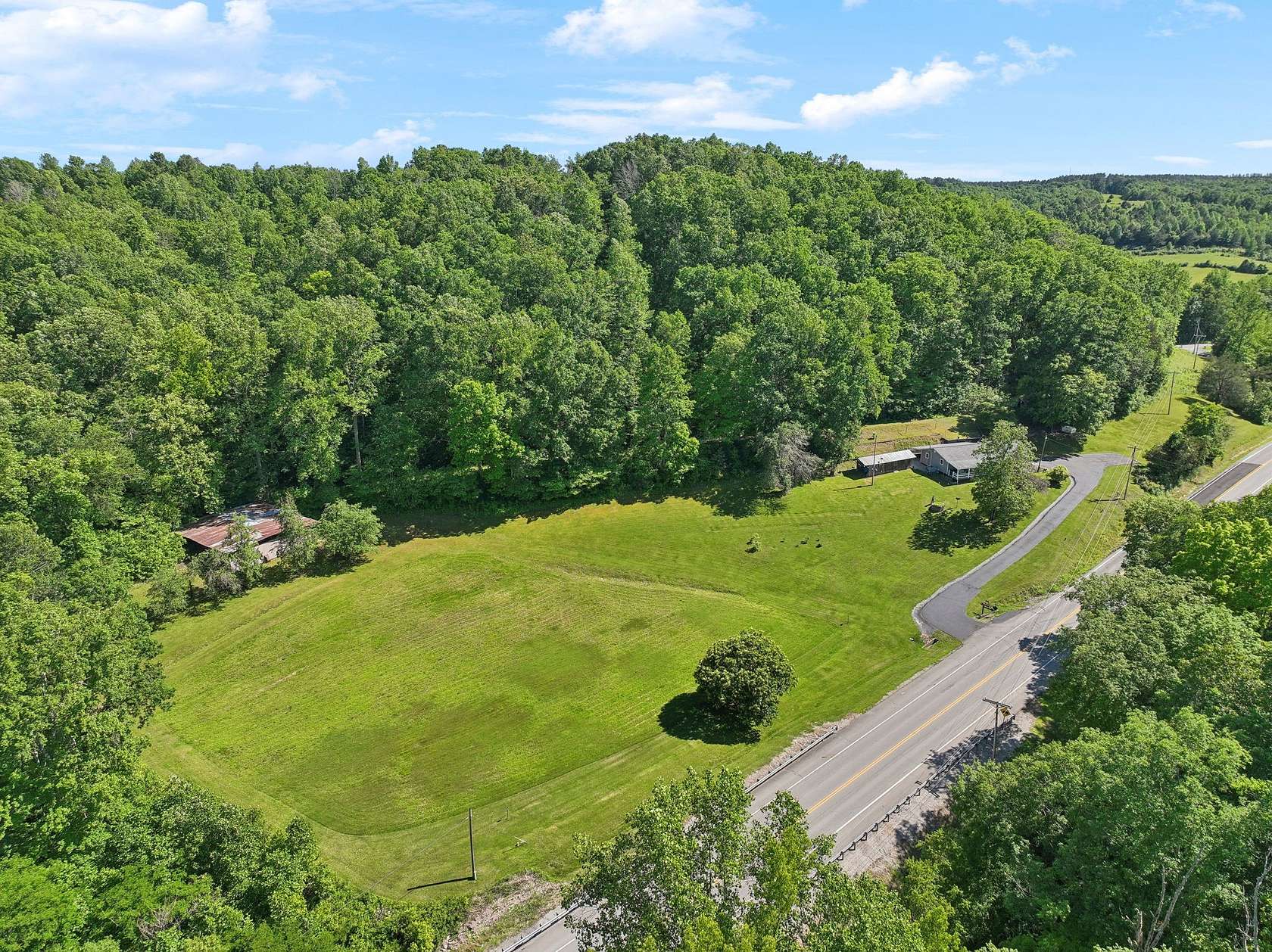 23 Acres of Recreational Land with Home for Sale in Hohenwald, Tennessee