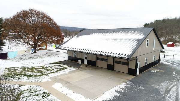 8 Acres of Land with Home for Auction in Spring Mills, Pennsylvania