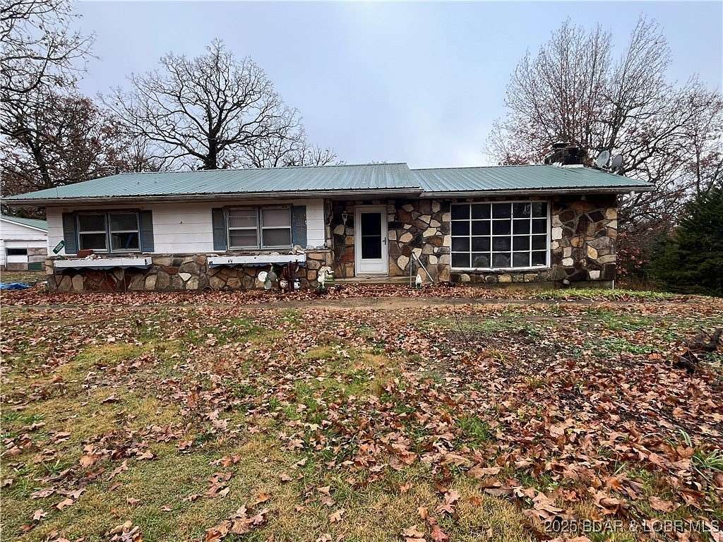 4.6 Acres of Residential Land with Home for Sale in Versailles, Missouri