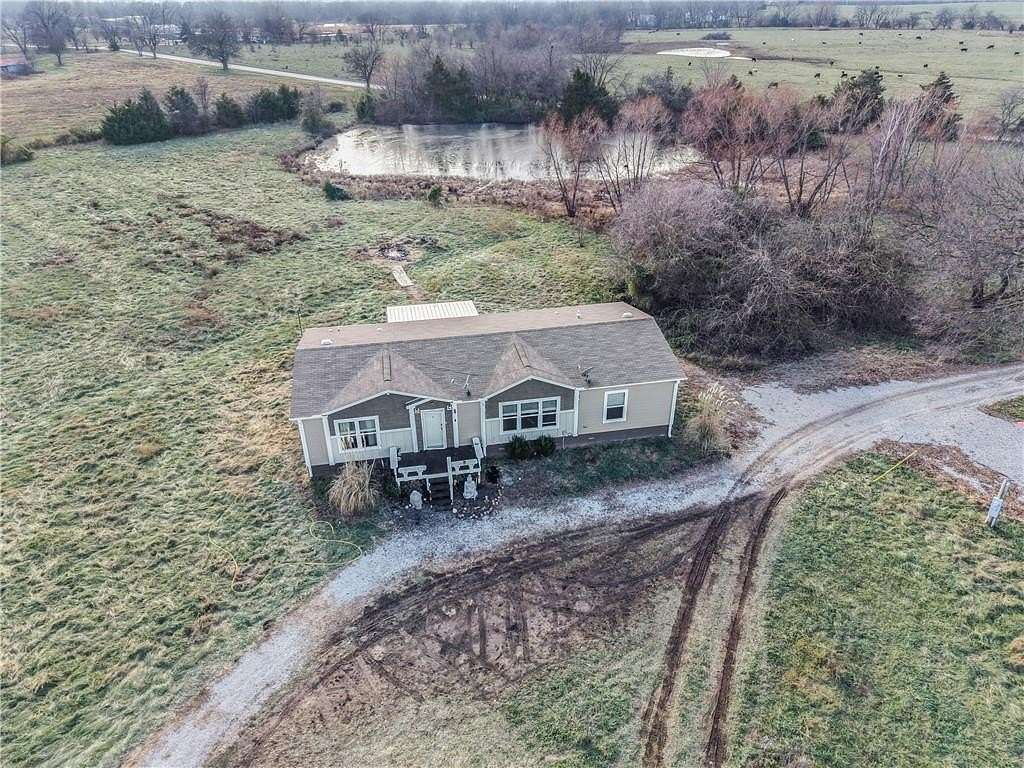 9.6 Acres of Residential Land with Home for Sale in Clinton, Missouri