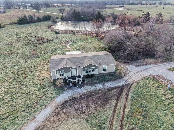 9.6 Acres of Residential Land with Home for Sale in Clinton, Missouri