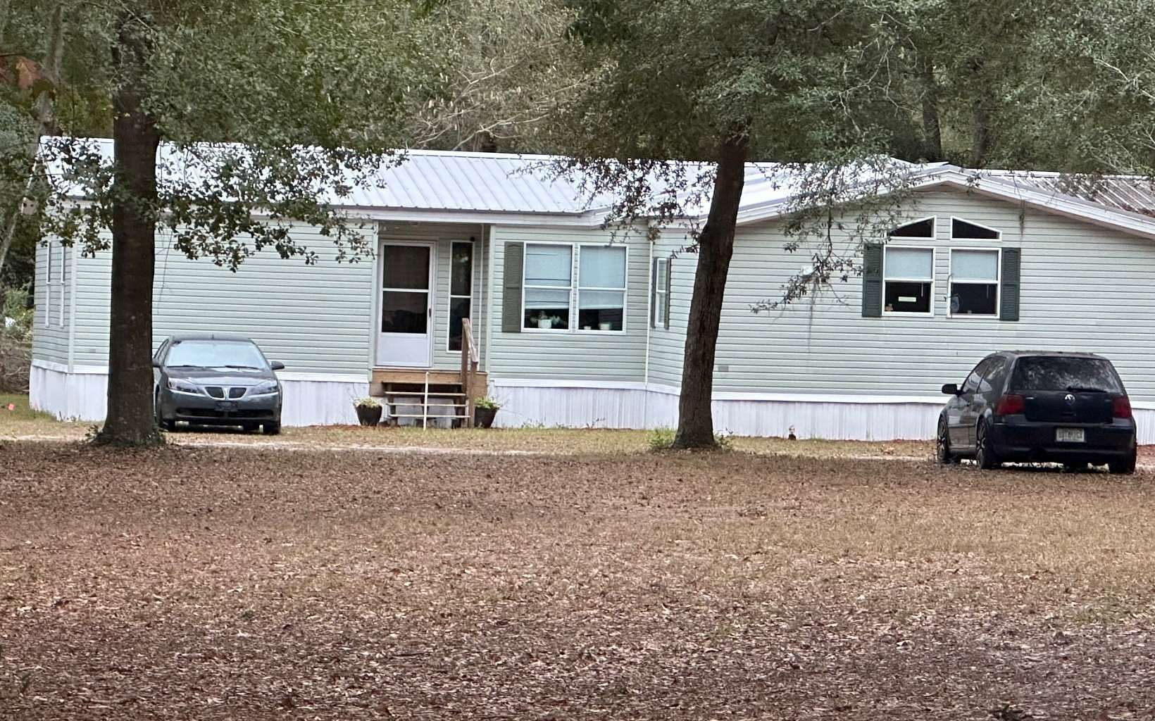 2.5 Acres of Residential Land with Home for Sale in Lake City, Florida