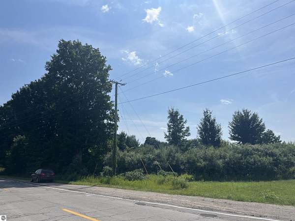 13.6 Acres of Commercial Land for Sale in Williamsburg, Michigan