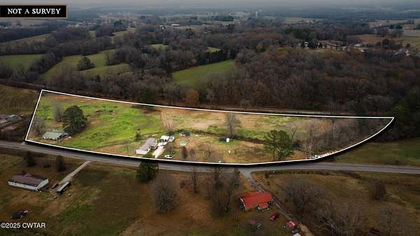 8.5 Acres of Land with Home for Sale in Gleason, Tennessee