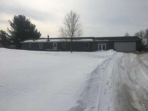 5 Acres of Residential Land with Home for Sale in Big Rapids, Michigan