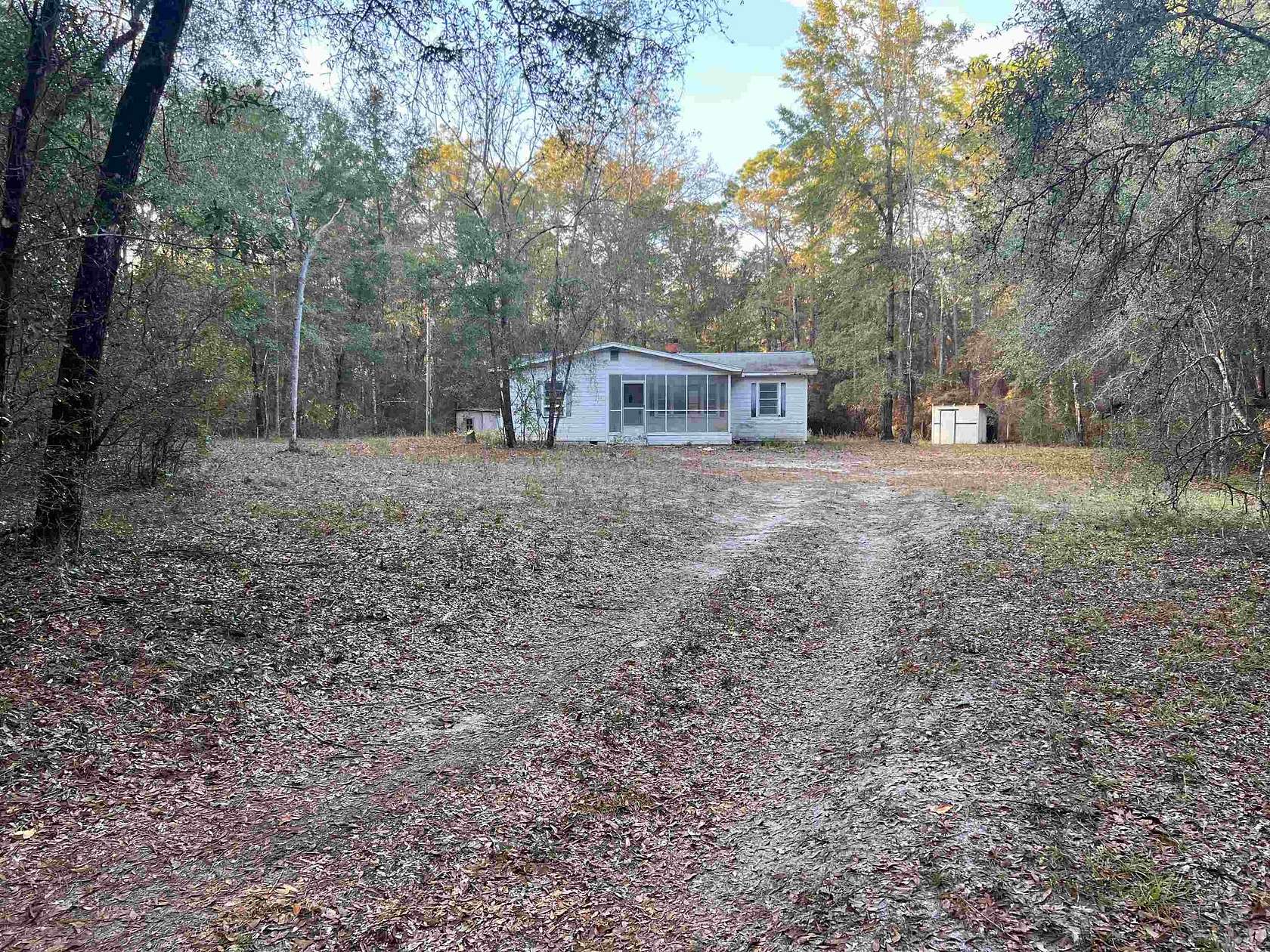 9.32 Acres of Residential Land with Home for Sale in Crawfordville, Florida