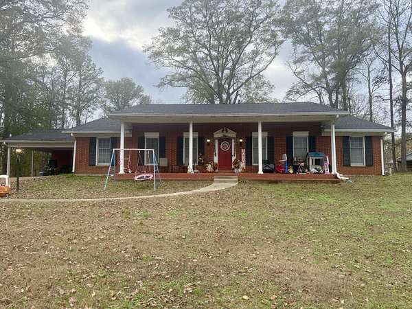 2.5 Acres of Residential Land with Home for Sale in Columbus, Mississippi