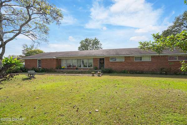 2.2 Acres of Residential Land with Home for Sale in Scotts Hill, Tennessee