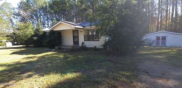 7.29 Acres of Residential Land with Home for Sale in Savannah, Tennessee