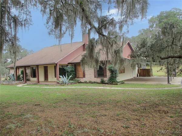 12.6 Acres of Land with Home for Sale in Floral City, Florida