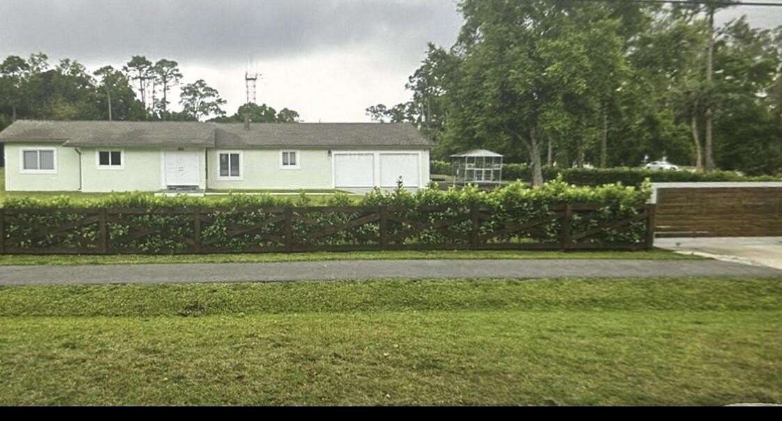 1.77 Acres of Residential Land with Home for Sale in West Palm Beach, Florida