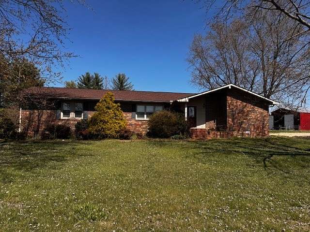 8.87 Acres of Residential Land with Home for Auction in Flintville, Tennessee