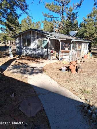 6.14 Acres of Residential Land with Home for Sale in Parks, Arizona