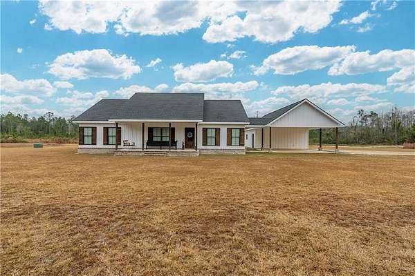 20.3 Acres of Recreational Land with Home for Sale in Waycross, Georgia