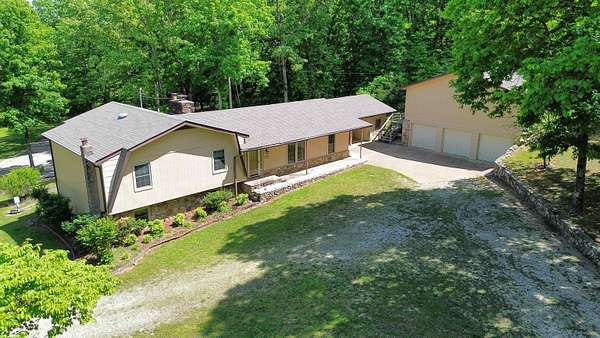 13.6 Acres of Land with Home for Sale in Hardy, Arkansas