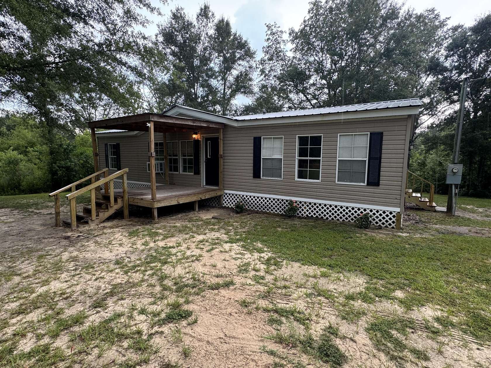 6.8 Acres of Residential Land with Home for Sale in Lumberton, Mississippi