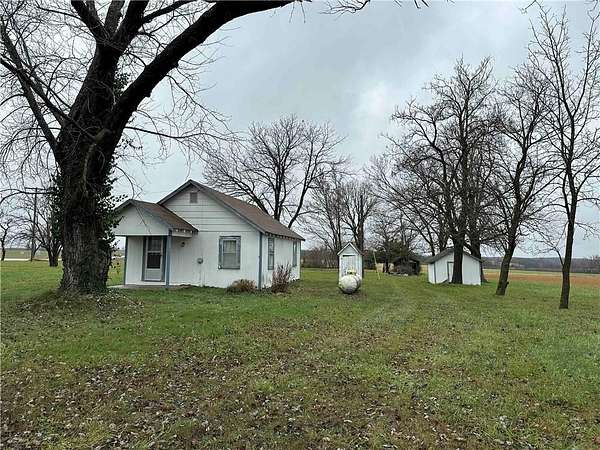 5 Acres of Residential Land with Home for Sale in Cross Timbers, Missouri