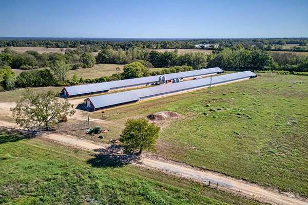 76.4 Acres of Agricultural Land with Home for Sale in McCaskill, Arkansas